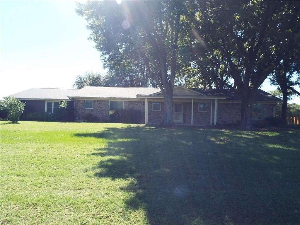 3 Acres of Residential Land with Home for Lease in Terrell, Texas