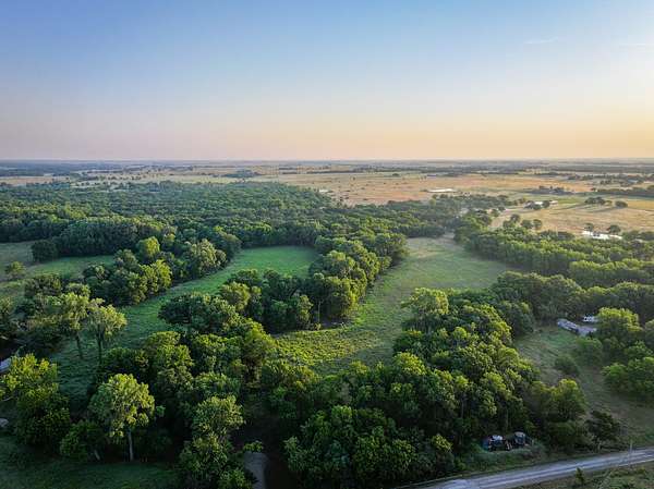 110 Acres of Land with Home for Sale in Delaware, Oklahoma
