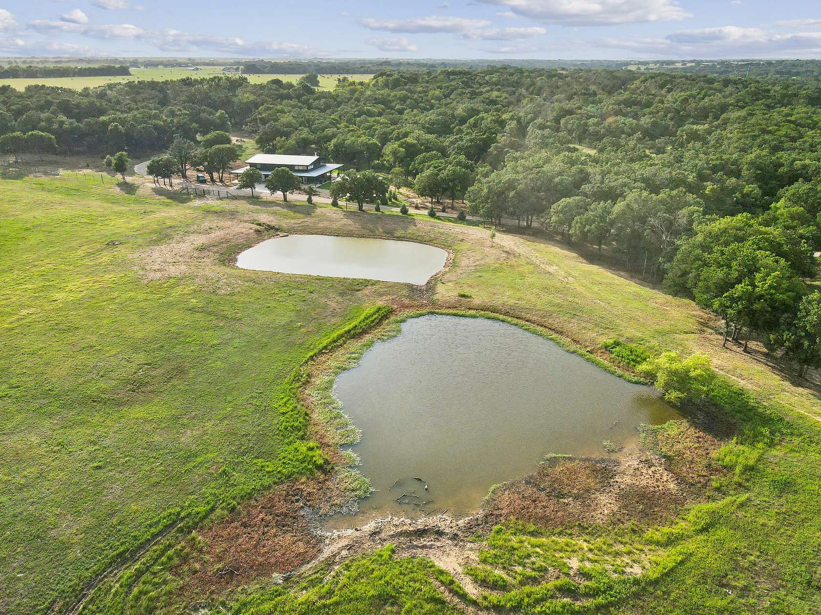 70.2 Acres of Land with Home for Sale in Grandview, Texas