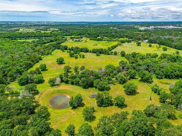 26 Acres of Agricultural Land with Home for Sale in Cleburne, Texas