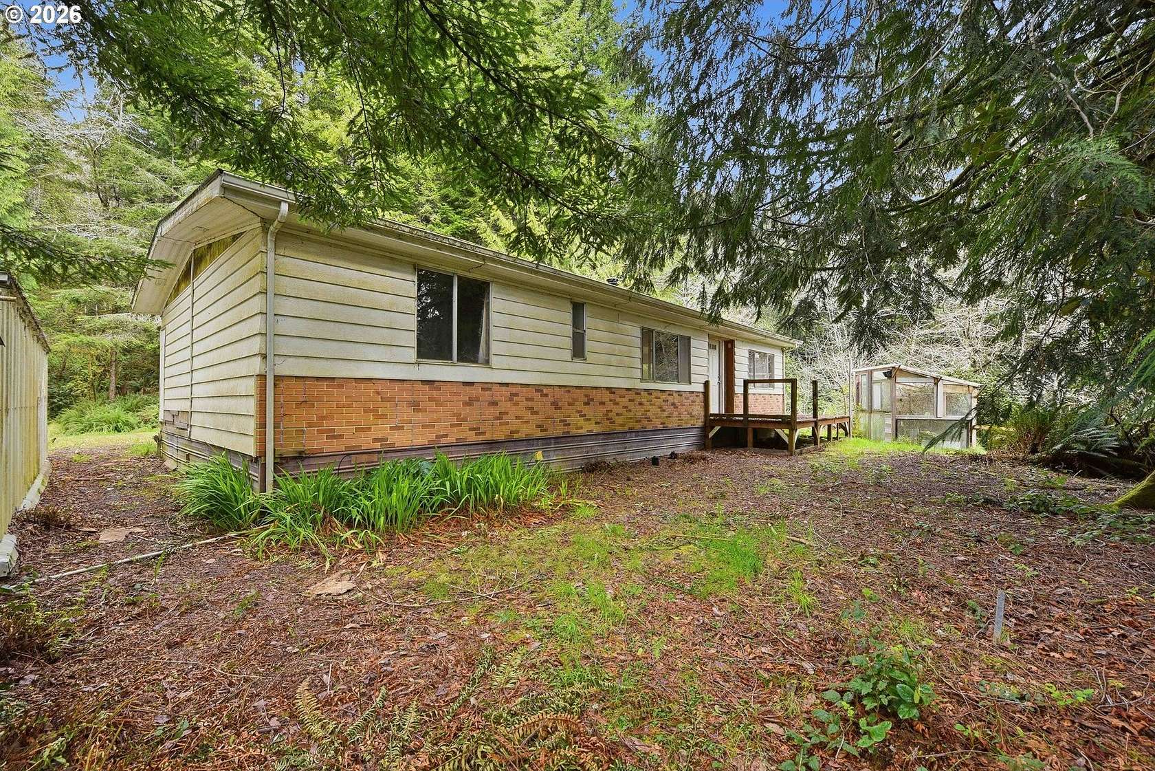 2 Acres of Land with Home for Sale in North Bend, Oregon