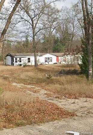 9.19 Acres of Residential Land with Home for Sale in Manistee, Michigan