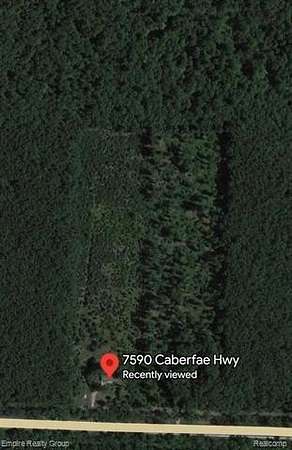 9.19 Acres of Land with Home for Sale in Manistee, Michigan