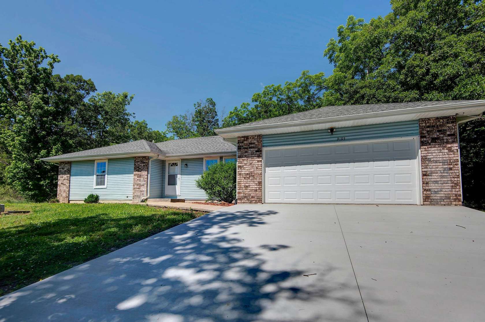 10 Acres of Residential Land with Home for Sale in Humansville, Missouri