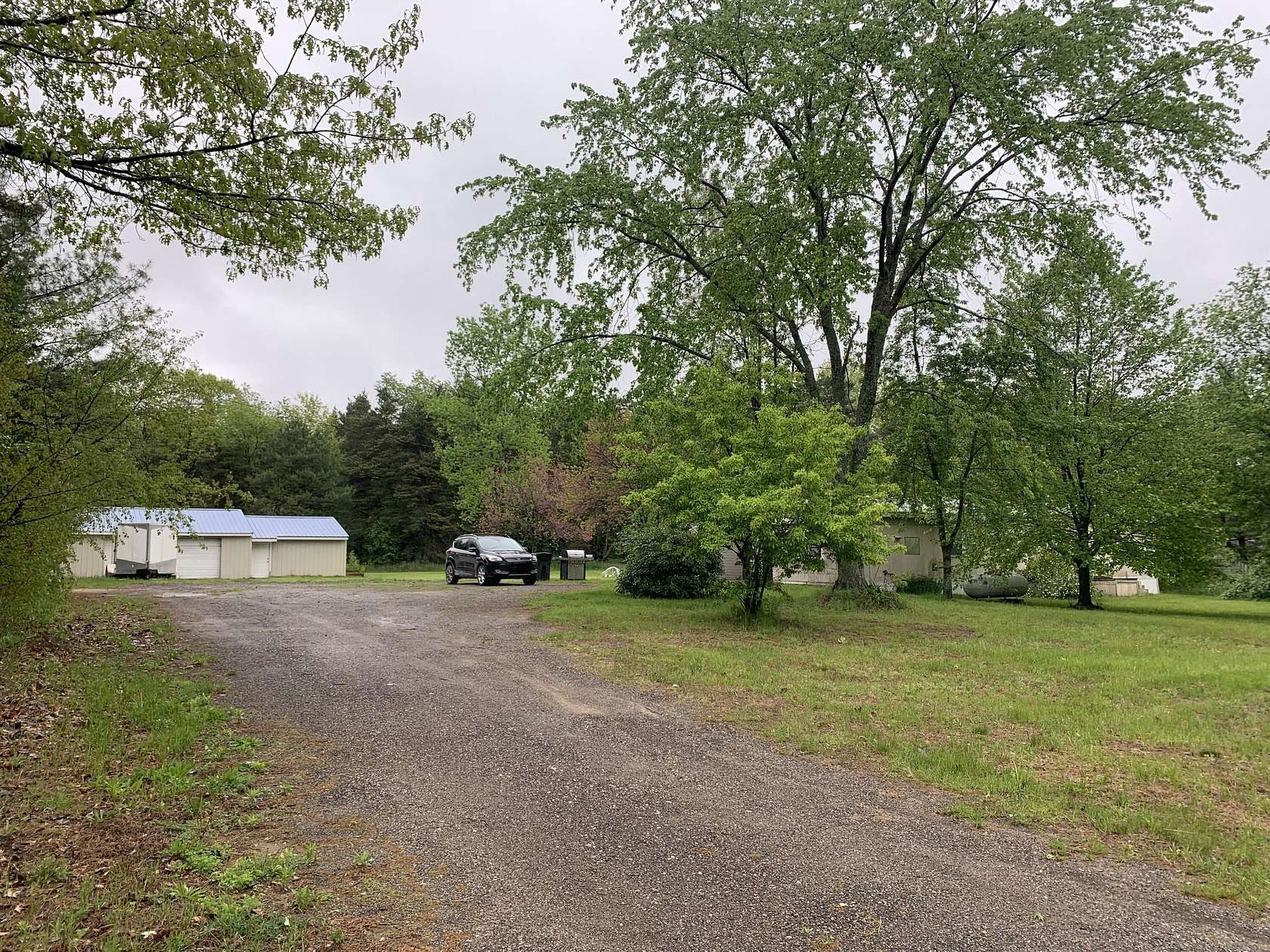 1.5 Acres of Residential Land with Home for Sale in Cedar Springs, Michigan