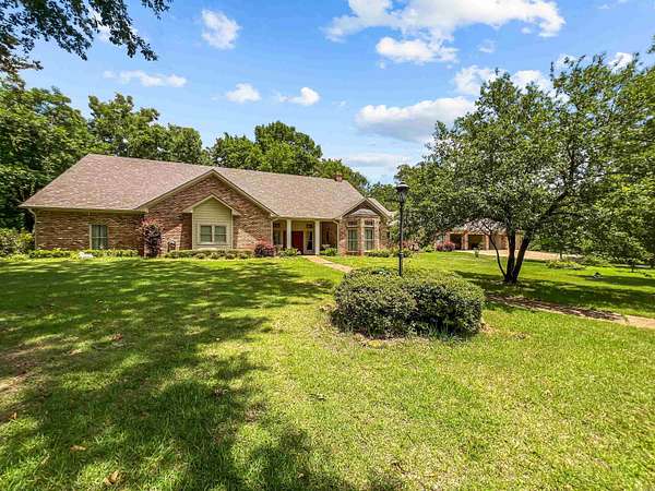 5.79 Acres of Land with Home for Sale in New Boston, Texas