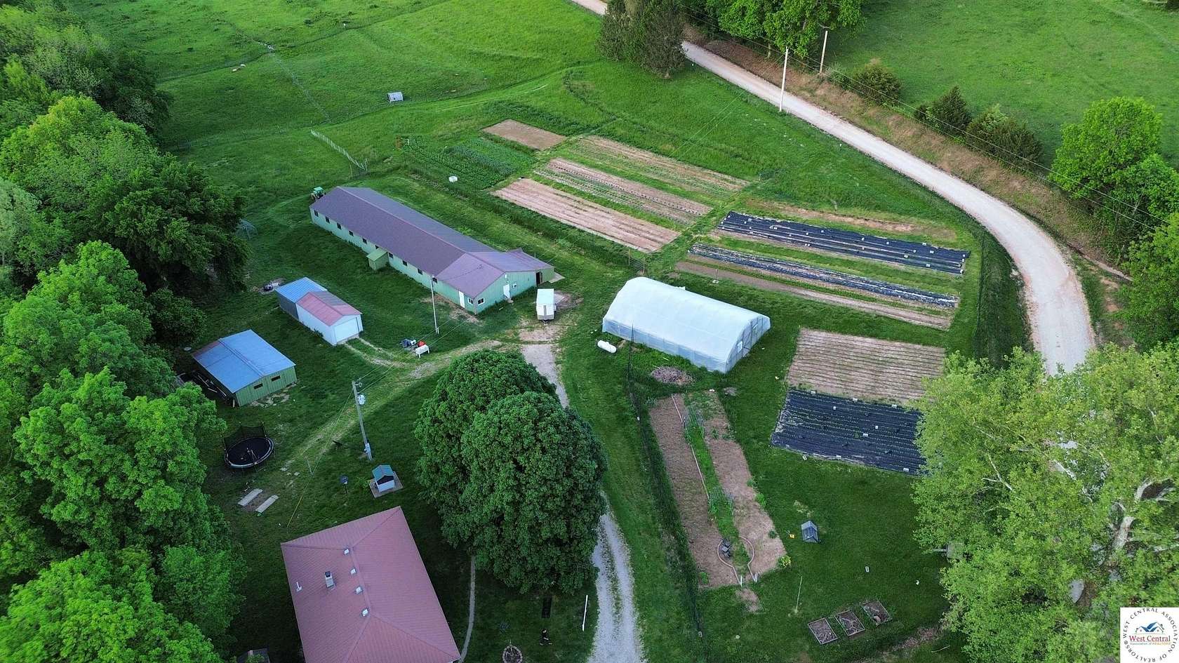 9.82 Acres of Residential Land with Home for Sale in Stover, Missouri