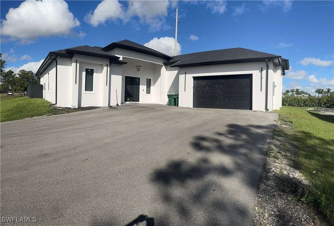 1.66 Acres of Residential Land with Home for Sale in Naples, Florida