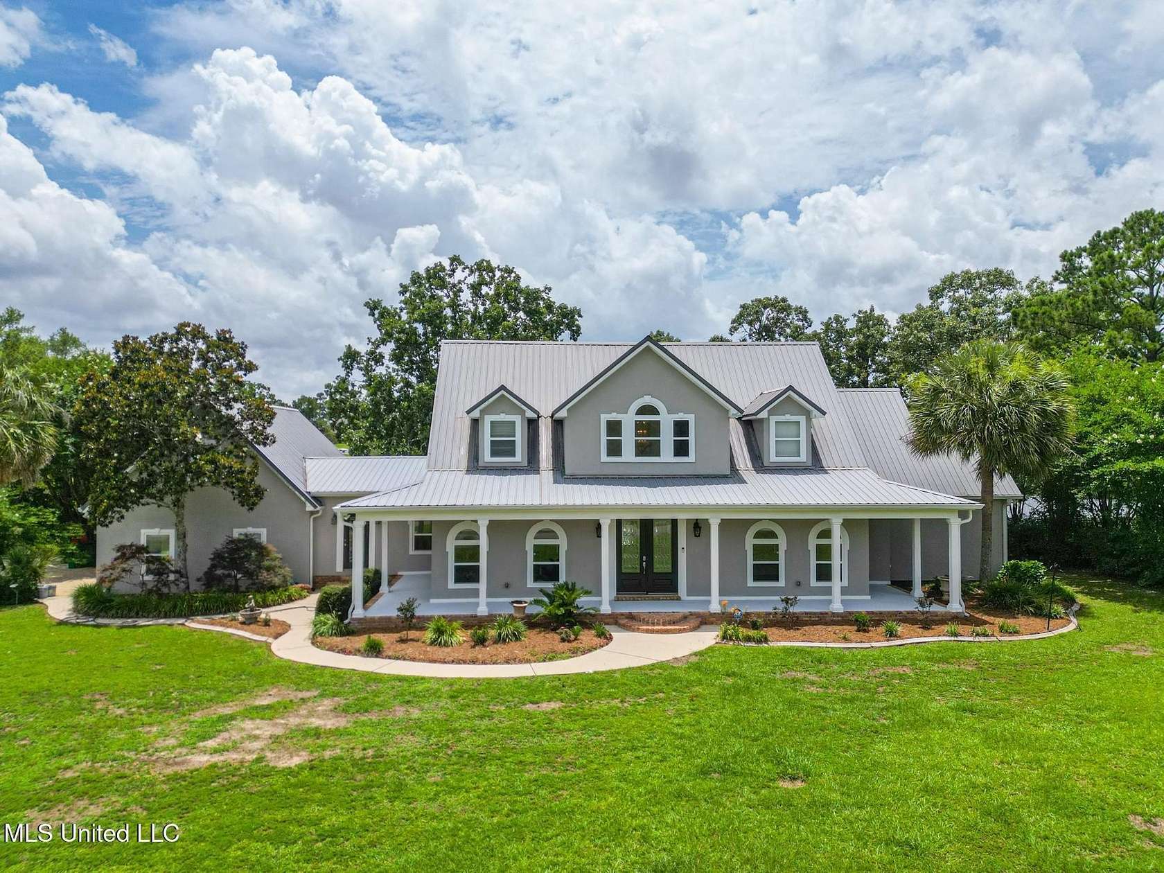 1.77 Acres of Land with Home for Sale in Kiln, Mississippi