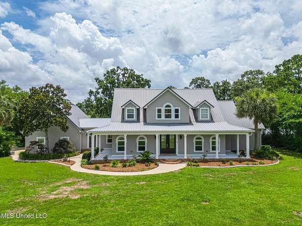 1.77 Acres of Land with Home for Sale in Kiln, Mississippi