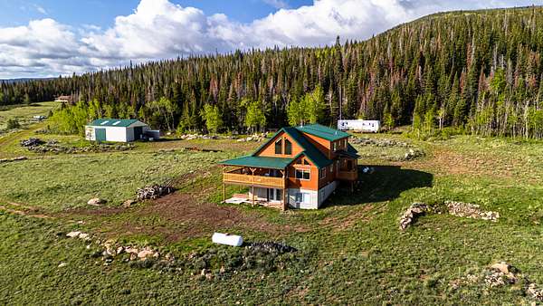 72.5 Acres of Recreational Land with Home for Sale in Red Feather Lakes, Colorado