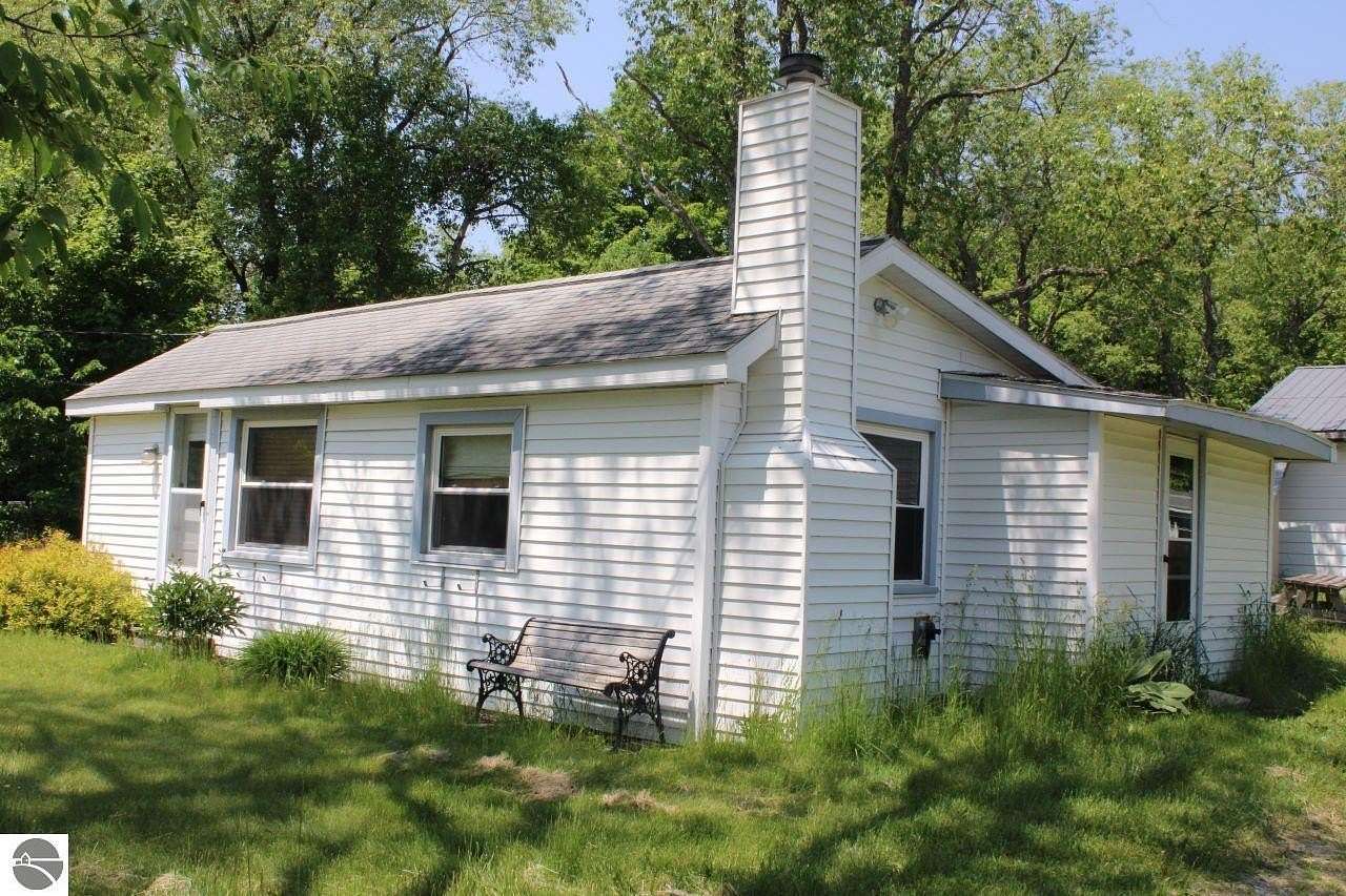 2 Acres of Residential Land with Home for Sale in Mancelona, Michigan