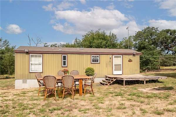 5.57 Acres of Residential Land with Home for Sale in Rockdale, Texas