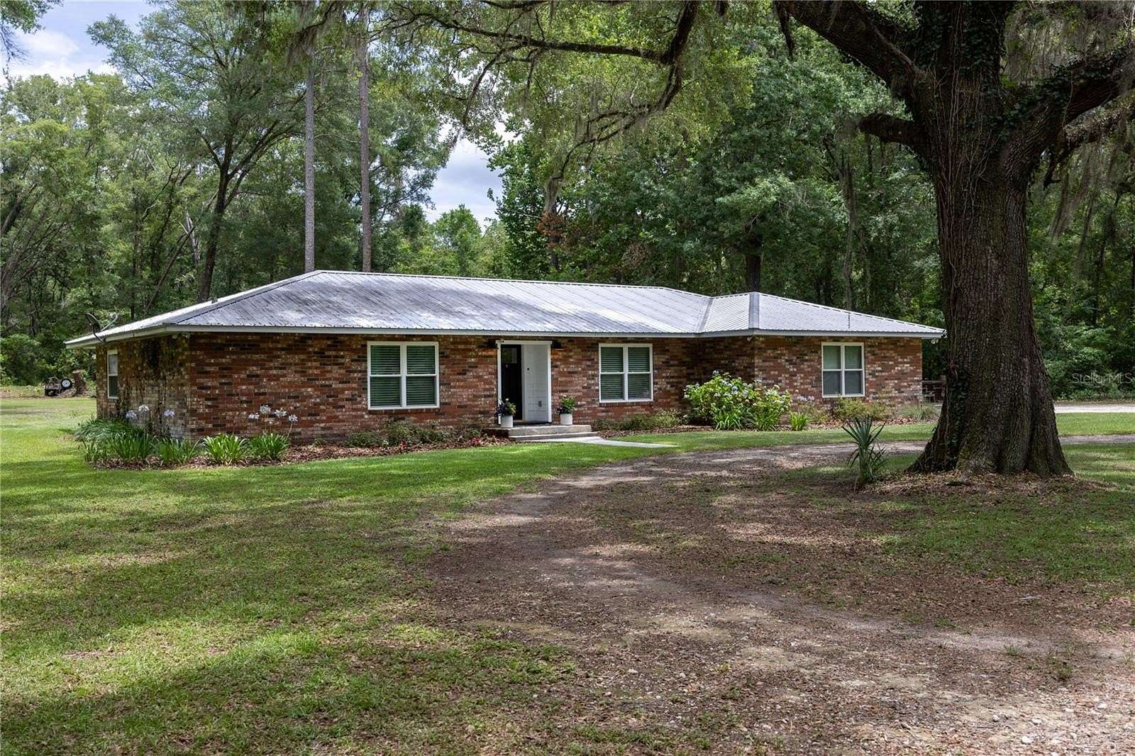 5 Acres of Land with Home for Sale in Alachua, Florida