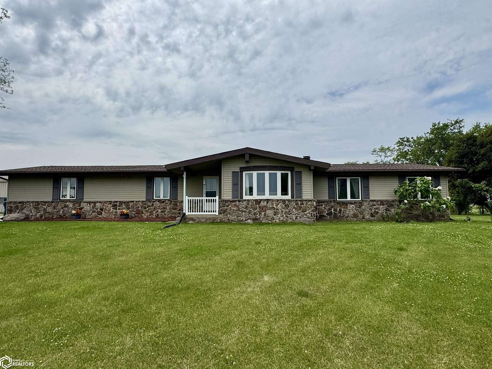 5.2 Acres of Residential Land with Home for Sale in Coon Rapids, Iowa