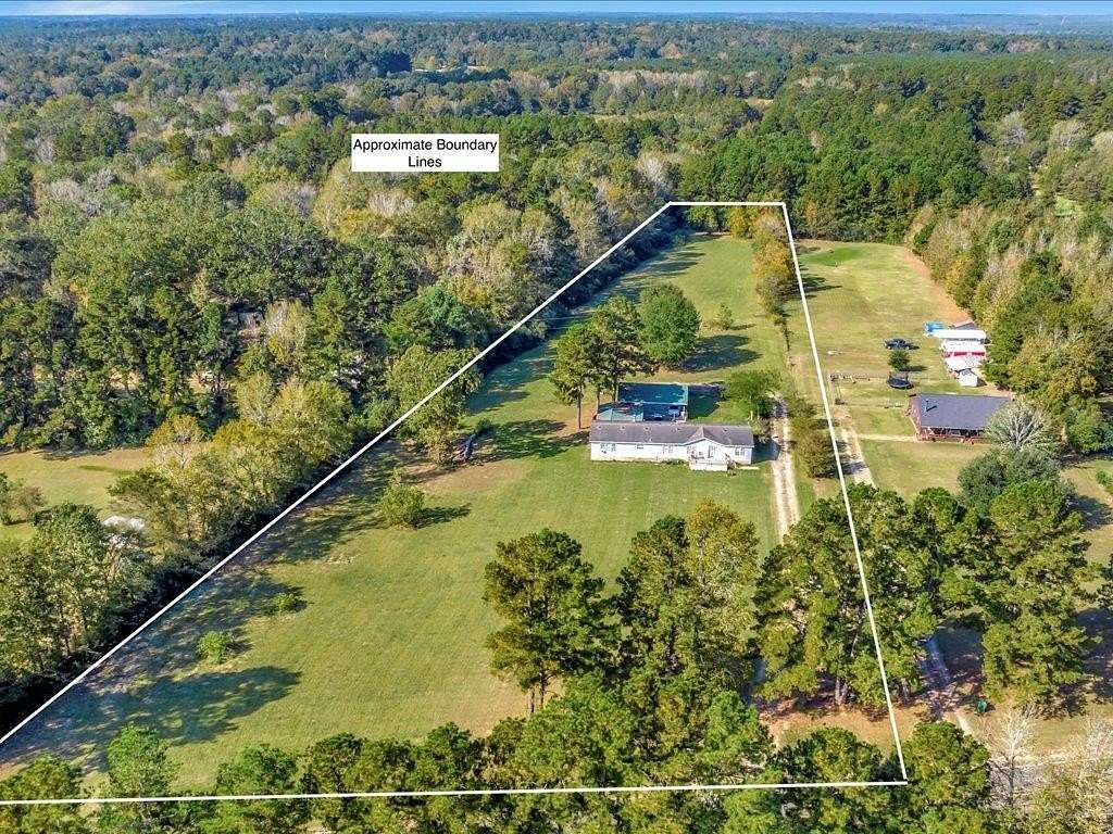 3.87 Acres of Land with Home for Sale in Huntington, Texas