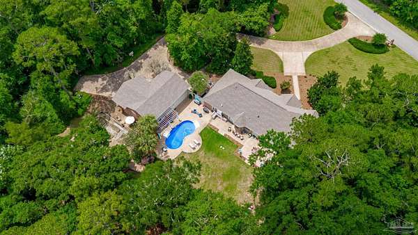 2.54 Acres of Residential Land with Home for Sale in Pace, Florida