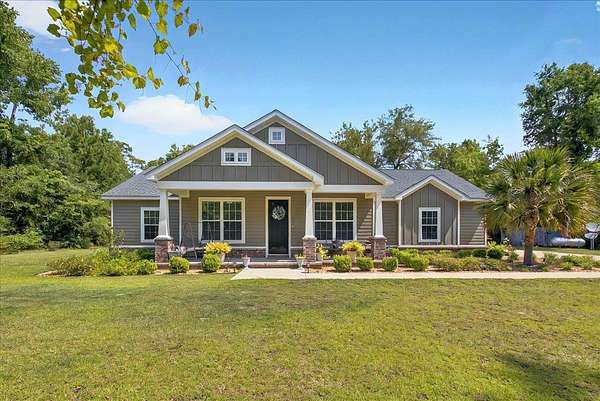 5 Acres of Residential Land with Home for Sale in Crawfordville, Florida