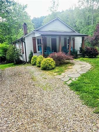 3.73 Acres of Residential Land with Home for Sale in Millers Creek, North Carolina