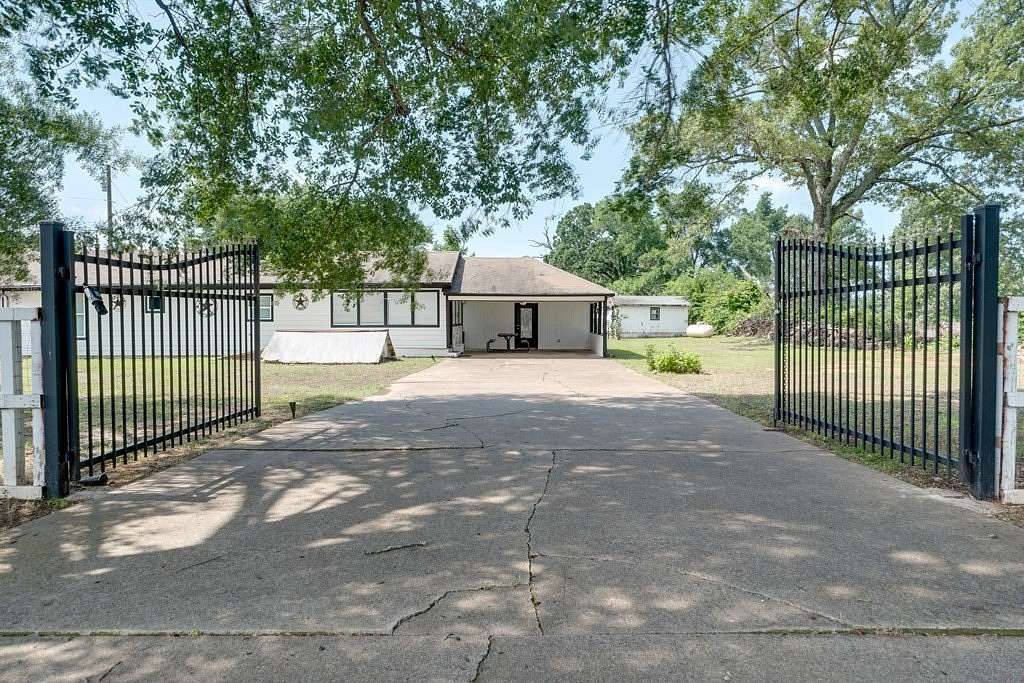 1.83 Acres of Land with Home for Sale in Palestine, Texas
