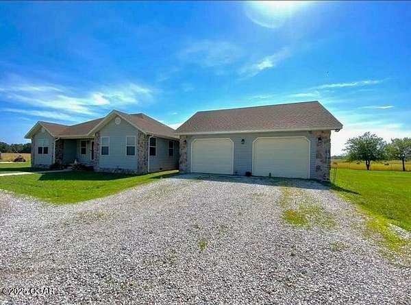 38 Acres of Land with Home for Sale in Stark City, Missouri