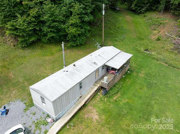 20.3 Acres of Recreational Land with Home for Sale in Marshall, North Carolina