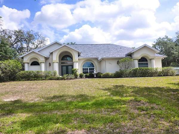 2.4 Acres of Land with Home for Sale in Weeki Wachee, Florida