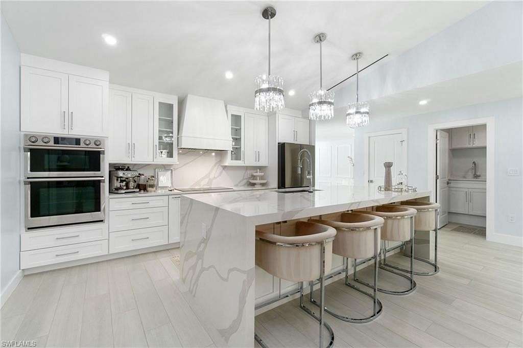 2.27 Acres of Residential Land with Home for Sale in Naples, Florida