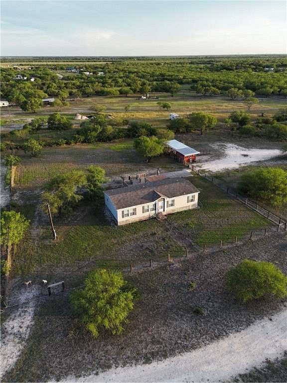 10 Acres of Land with Home for Sale in Orange Grove, Texas