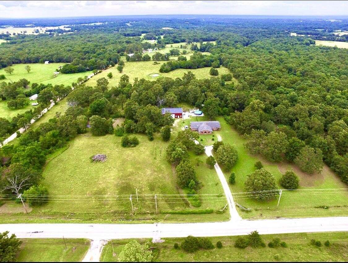 20 Acres of Agricultural Land with Home for Sale in Eucha, Oklahoma