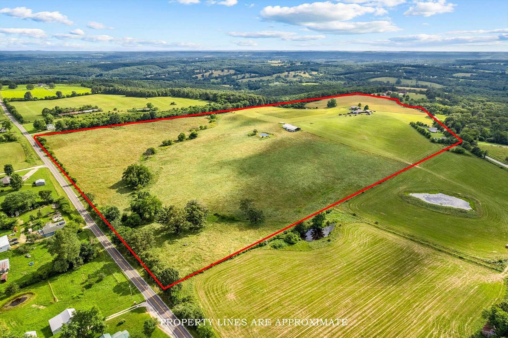 69 Acres of Land with Home for Sale in Mansfield, Missouri