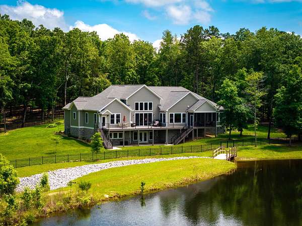 10.6 Acres of Land with Home for Sale in Ooltewah, Tennessee