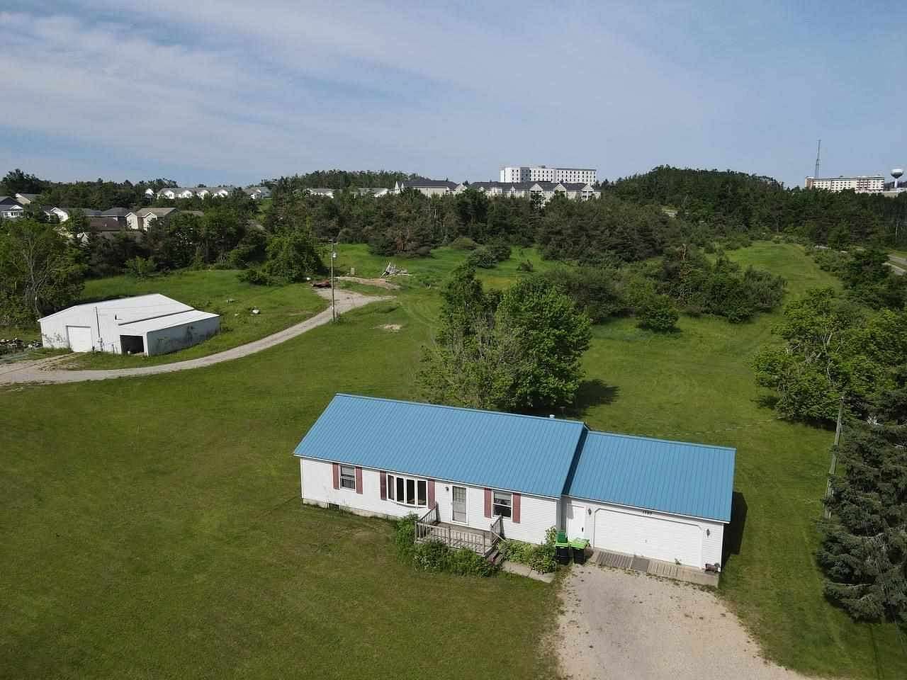 7.14 Acres of Residential Land with Home for Sale in Petoskey, Michigan