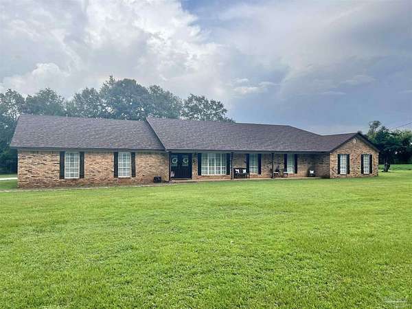 1.5 Acres of Residential Land with Home for Sale in Jay, Florida