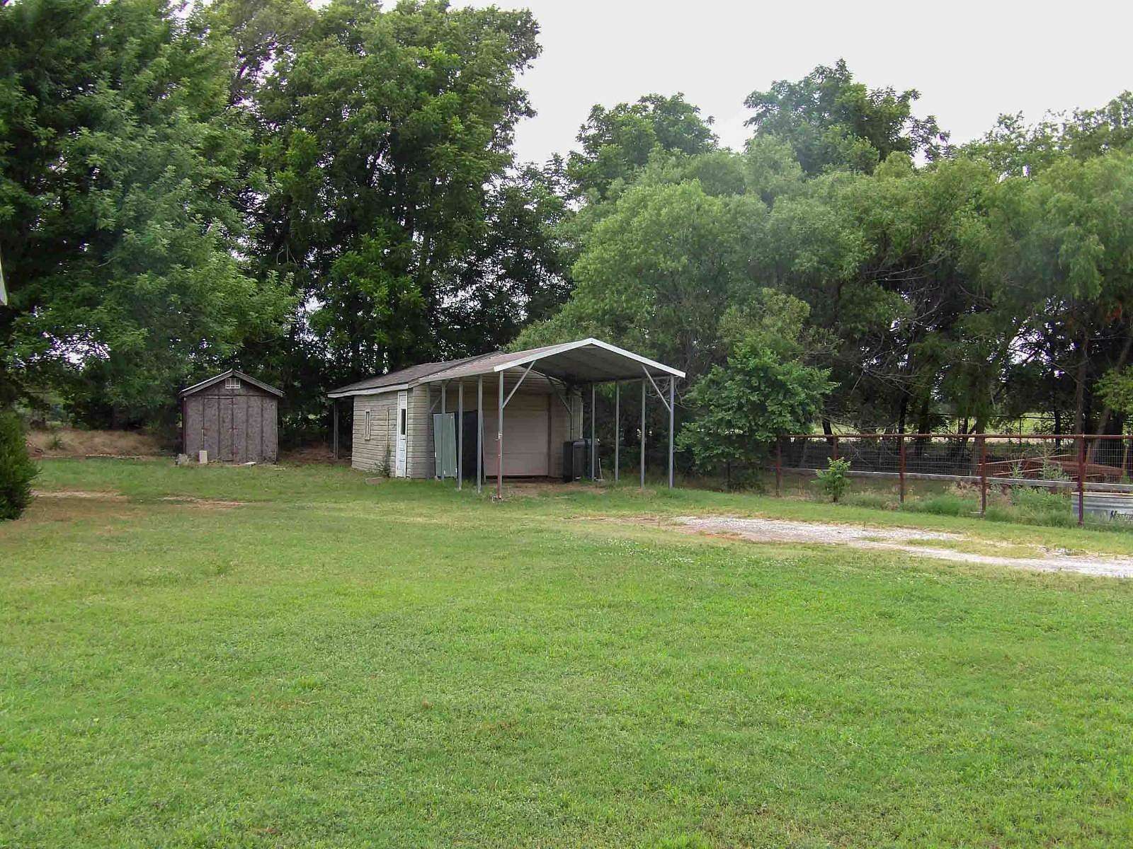 3.8 Acres of Residential Land with Home for Sale in Hennessey, Oklahoma
