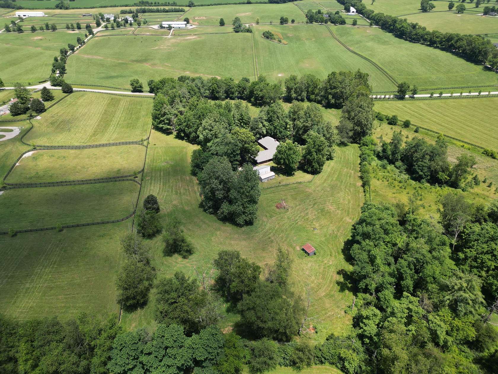 11.7 Acres of Land with Home for Sale in Versailles, Kentucky