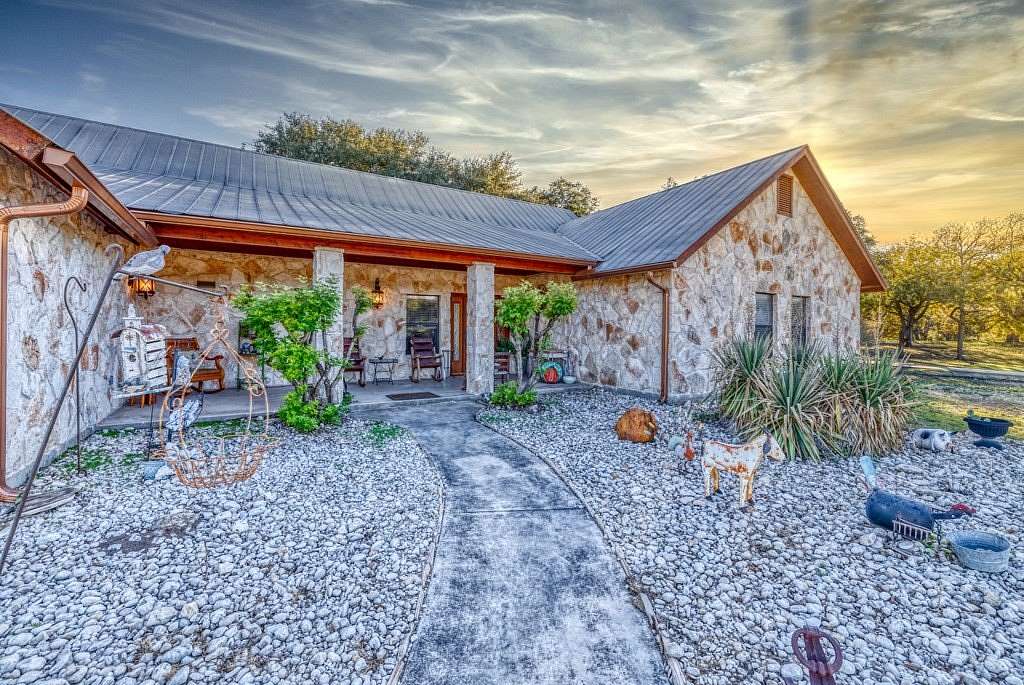 5 Acres of Residential Land with Home for Sale in Concan, Texas