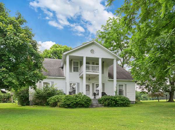 247 Acres of Land with Home for Sale in Decaturville, Tennessee