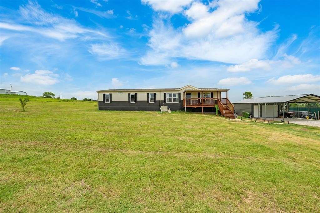 5 Acres of Residential Land with Home for Sale in Boyd, Texas