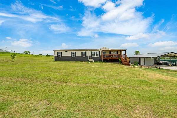 5 Acres of Residential Land with Home for Sale in Boyd, Texas