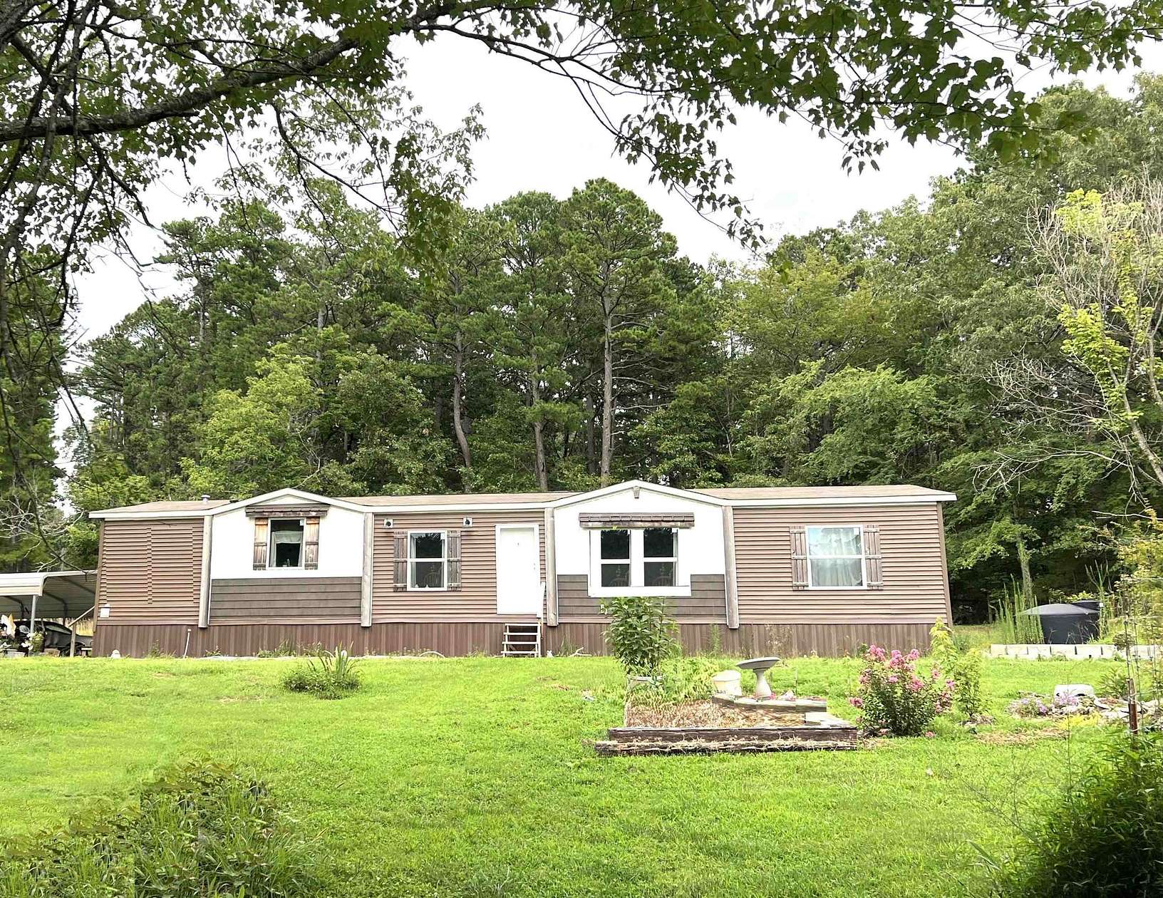3.48 Acres of Land with Home for Sale in Mountain View, Arkansas