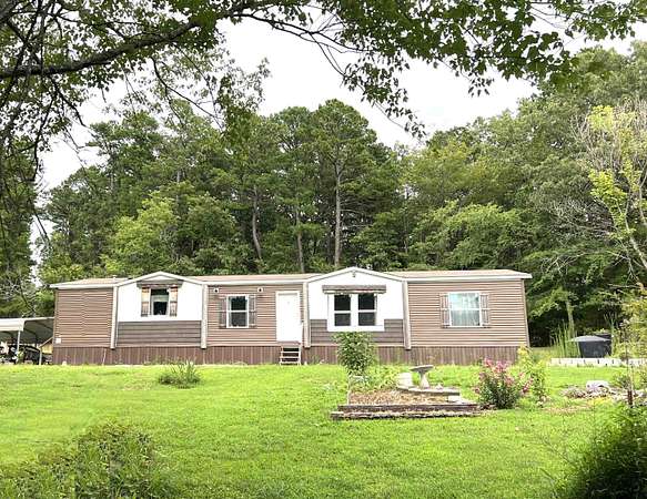 3.48 Acres of Land with Home for Sale in Mountain View, Arkansas