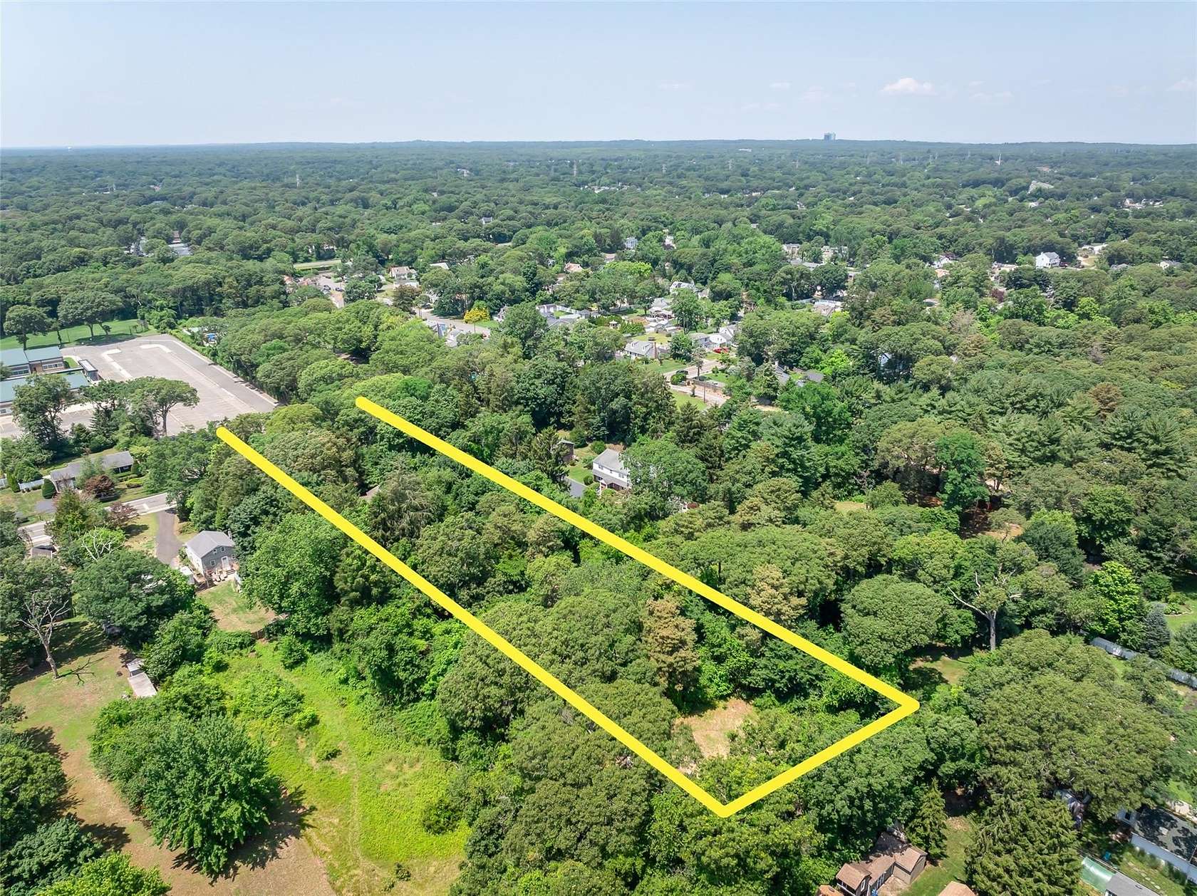 2 Acres of Residential Land with Home for Sale in Centereach, New York