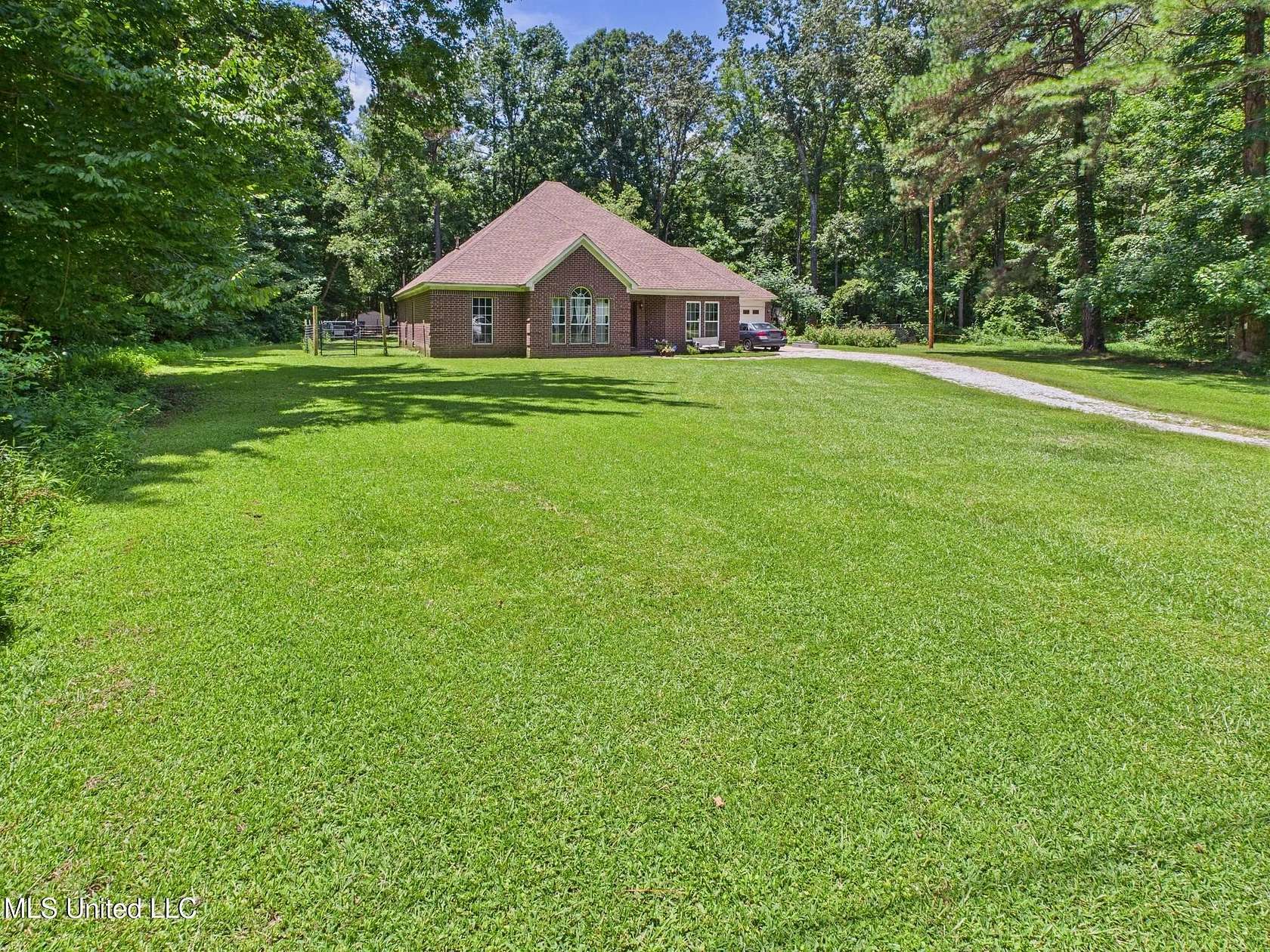 5.6 Acres of Residential Land with Home for Sale in Holly Springs, Mississippi