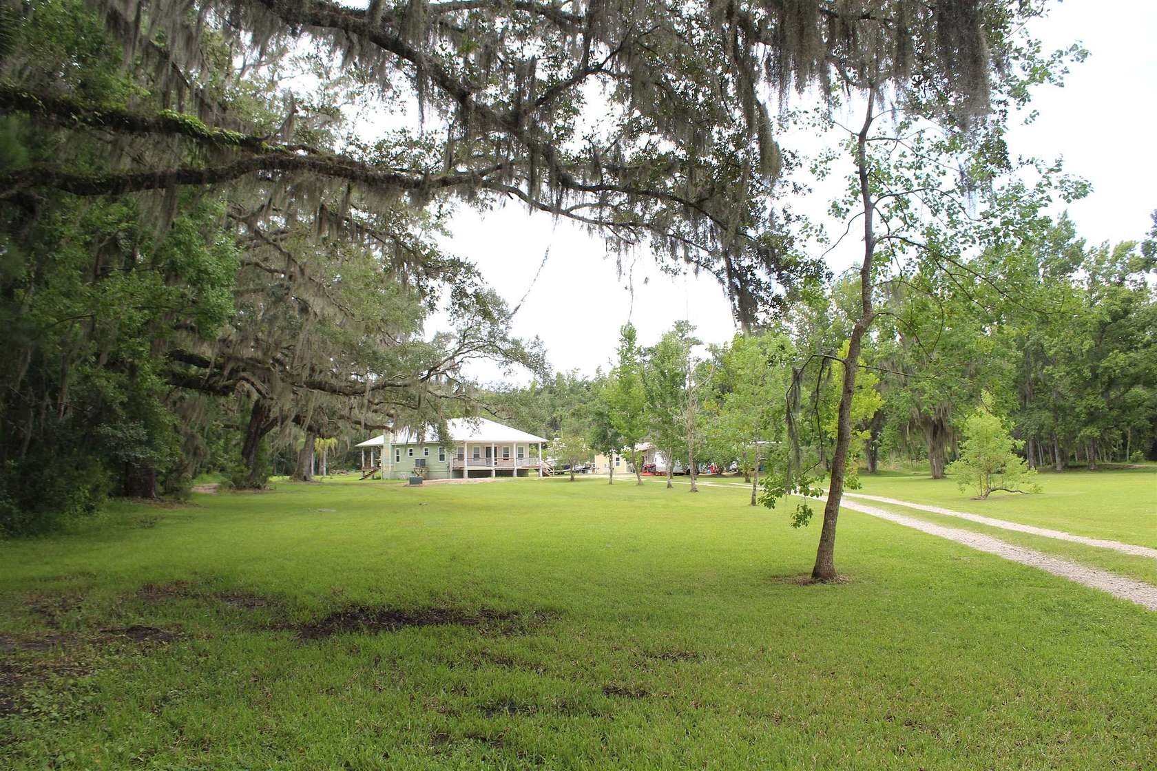 5.6 Acres of Residential Land with Home for Sale in East Palatka, Florida