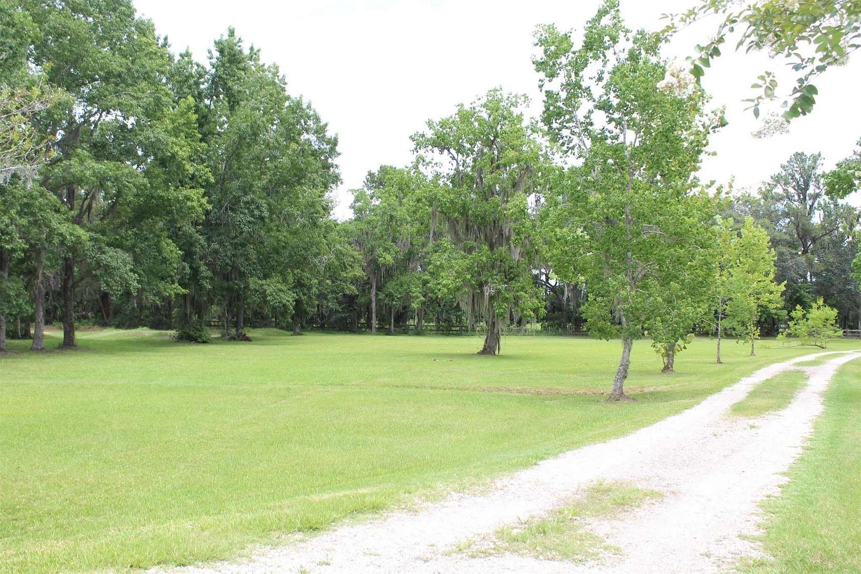 5.6 Acres of Land with Home for Sale in East Palatka, Florida