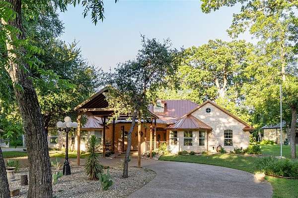 2.47 Acres of Residential Land with Home for Sale in Glen Rose, Texas