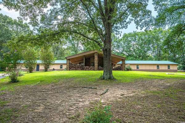 4.25 Acres of Land with Home for Sale in Bismarck, Arkansas