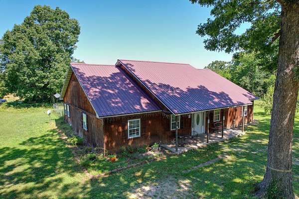 5 Acres of Residential Land with Home for Sale in Niangua, Missouri