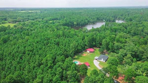 8.2 Acres of Land with Home for Sale in Palestine, Texas